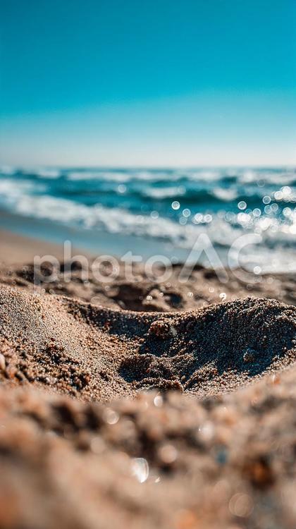 太陽が降り注ぐ砂浜の情景 砂,砂浜,ビーチの写真素材