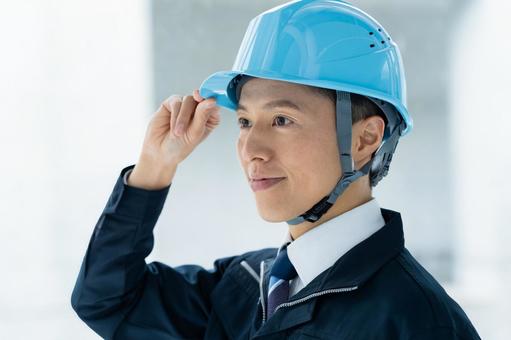 作業服のビジネスマン 作業服のビジネスマン 作業服,笑顔,管理の写真素材
