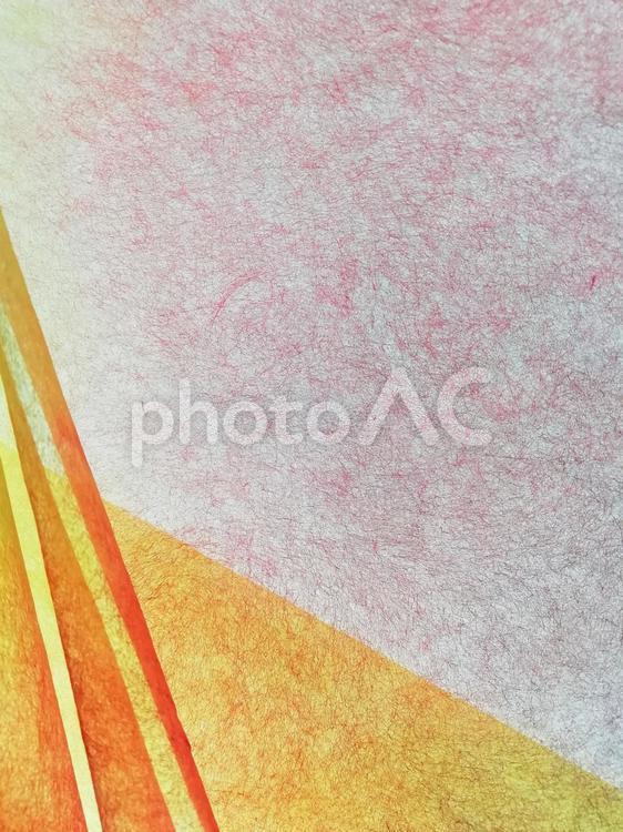 和紙　ざらざら赤色に重ねた黄色と赤色 和紙,紙,背景の写真素材