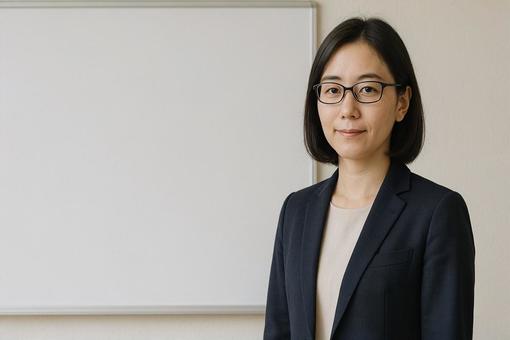 メガネの先生の写真