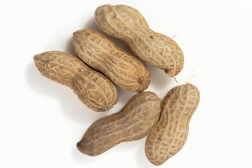 Shelled peanuts on a white background, JPG
