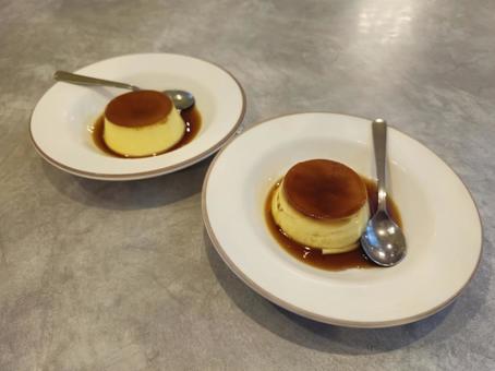 Two puddings on a stylish table, JPG