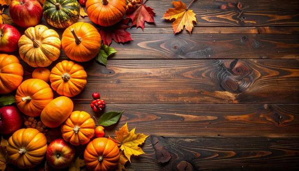 秋イメージしたカボチャとりんごのフレームの写真