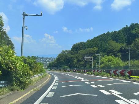 道路(高速道路) 道路(高速道路) 空,晴れ,カーブの写真素材