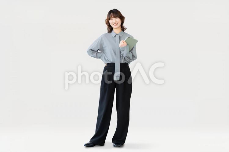 タブレットを持つ笑顔のビジネスウーマン 女性,笑顔,ビジネスの写真素材