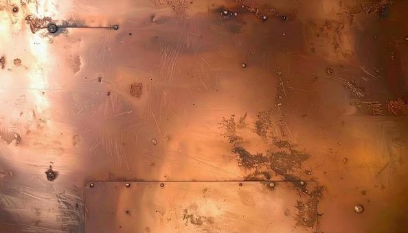 リベット打ちされた古びた銅板 リベット打ちされた古びた銅板の写真