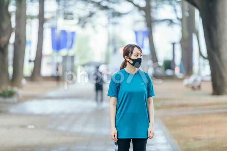 コロナ禍のジョギング　running 汗,女性,運動の写真素材