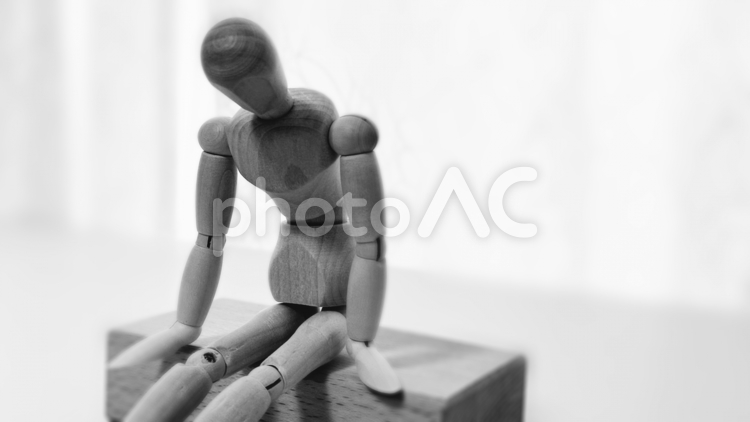 落ち込んでいる人のイメージ 落ち込む,悩む,悩みの写真素材