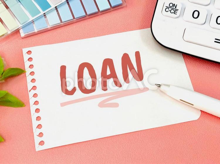 LOAN・ローンと書かれた紙と電卓 ローン,電卓,借入の写真素材