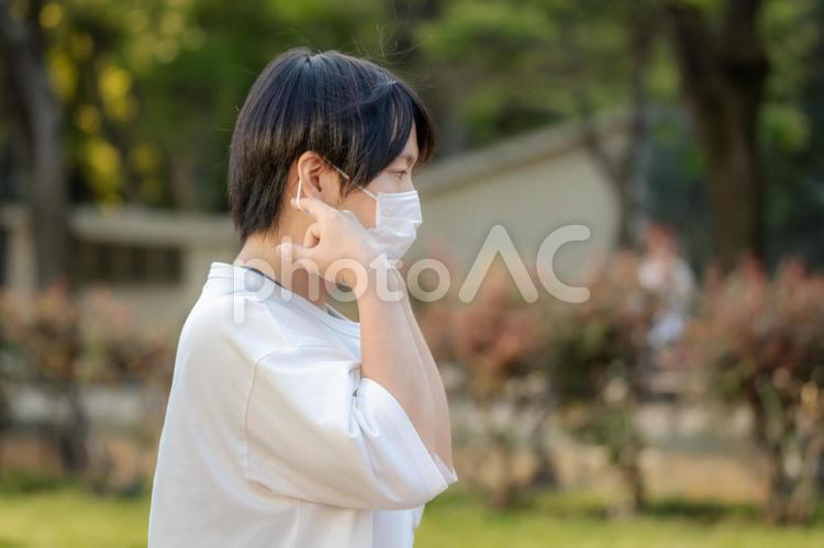 マスクをつける男性 男性,マスク,感染症予防の写真素材