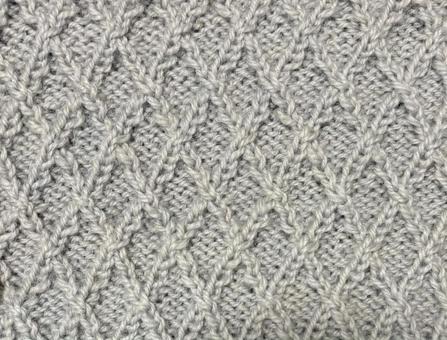 グレーニット交差編 手編み,編み目,テクスチャの写真素材