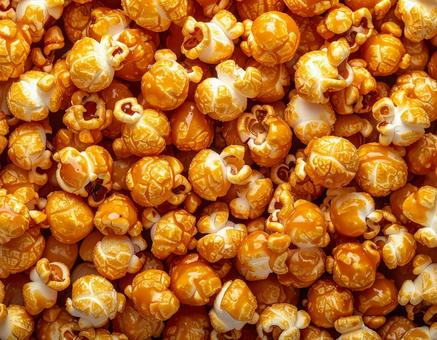 キャラメルポップコーンを敷き詰めた背景 キャラメルポップコーンを敷き詰めた背景の写真