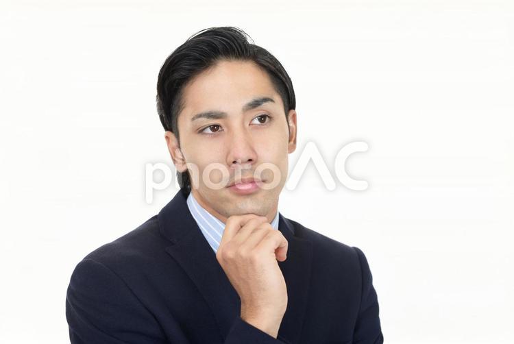 考える男性 仕事,ビジネス,ビジネスマンの写真素材