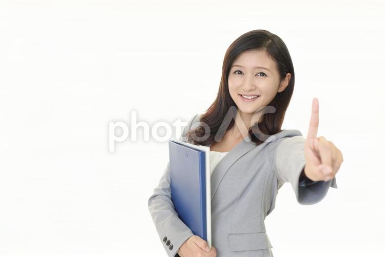 指さすビジネスウーマン 女性,ビジネスウーマン,仕事の写真素材