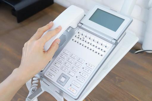 ビジネスフォン オフィスイメージ ビジネスフォン オフィスイメージ ビジネスフォン,電話対応,ビジネス電話の写真素材