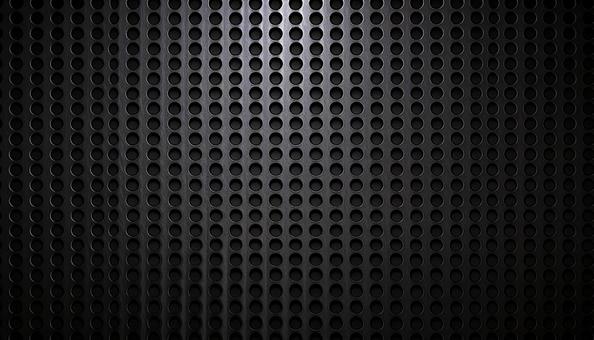 黒いパンチングメタル　金属背景の写真