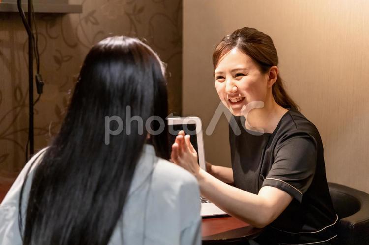 美容カウンセラー カウンセラー,肌診断,肌年齢の写真素材