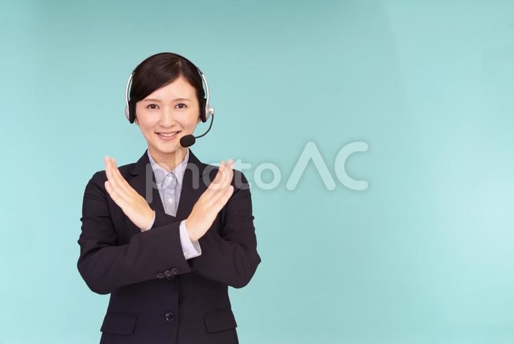 禁止のジェスチャーをするオペレーター 女性,ビジネス,仕事の写真素材