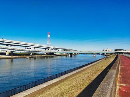 江戸川区側堤防から北の船堀橋を眺める 船堀橋,橋,河川の写真素材