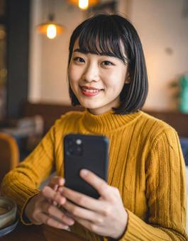 「待った?」「ぜんぜん!」カフェの彼女 「待った?」「ぜんぜん!」カフェの彼女の写真