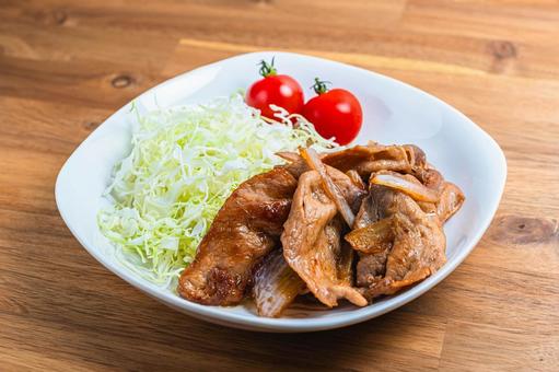 生姜焼きと千切りキャベツの盛り付け 生姜焼きと千切りキャベツの盛り付け 生姜焼き,豚肉,炒め物の写真素材