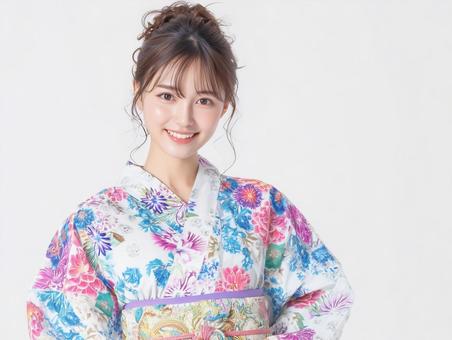 鮮やかな浴衣を着た日本人女性 鮮やかな浴衣を着た日本人女性の写真