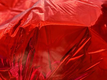 赤いホイルのシワ テクスチャ,シワ,しわくちゃの写真素材