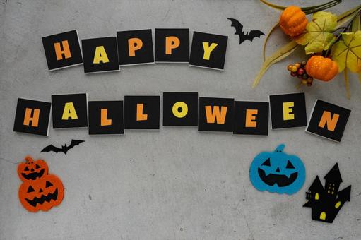 コンクリ背景のハロウィンデコレーション ハロウィン,ジャックオランタン,かぼちゃの写真素材