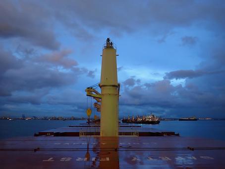 Geared ship at sunset, JPG Geared ship at sunset, JPG