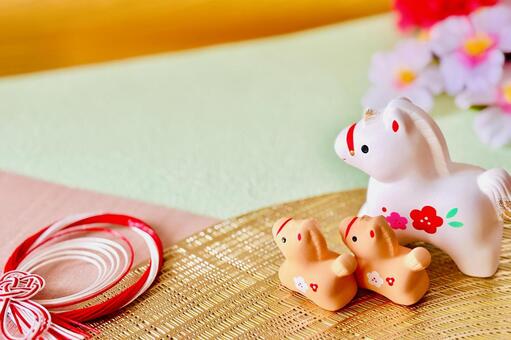 午年の年賀状素材　馬の親子と迎春飾り 午年,2026,午の写真素材