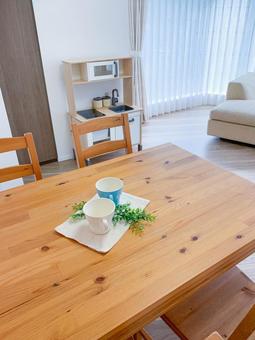 ダイニングルームのテーブル ダイニング,ソファ,カーテンの写真素材