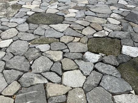 小さい石を敷き詰めた石畳 小さい石を敷き詰めた石畳 石畳,石,野外の写真素材