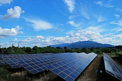 Solar panels, blue sky and mountains, JPG