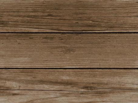 茶色い木目板壁の写真