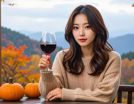 赤ワインを嗜む女性 赤ワインを嗜む女性の写真