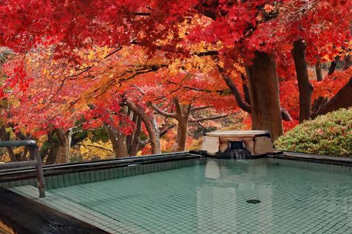 Open-air bath in the autumn leaves Open-air bath in the autumn leaves