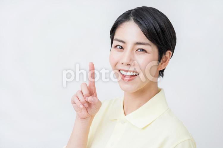 提案する介護士の女性。 介護,介護福祉士,介護士の写真素材