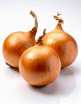 白い背景に複数の茶色い玉ねぎの写真