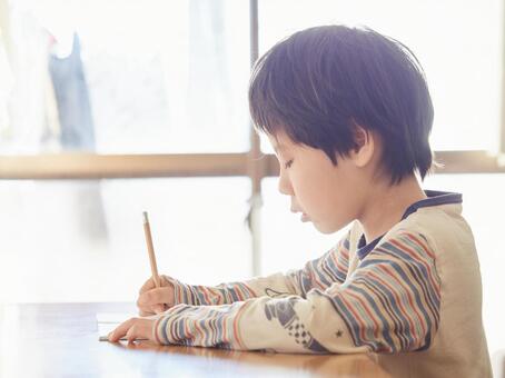 Elementary school students doing homework Elementary school students doing homework