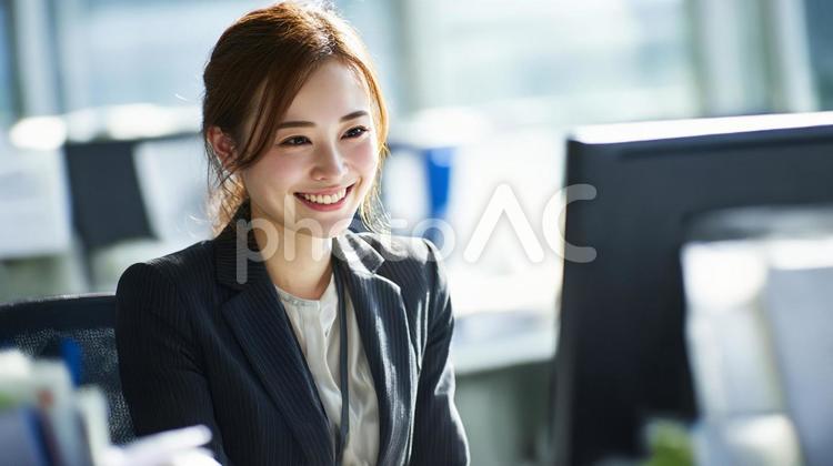 オフィスで働くスーツの女性5 女性,ビジネス,スーツの写真素材