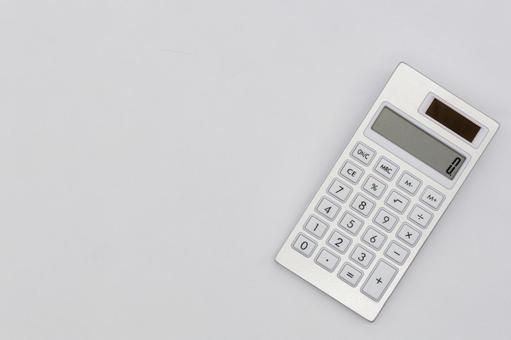 白背景に電卓 電卓,計算機,計算の写真素材