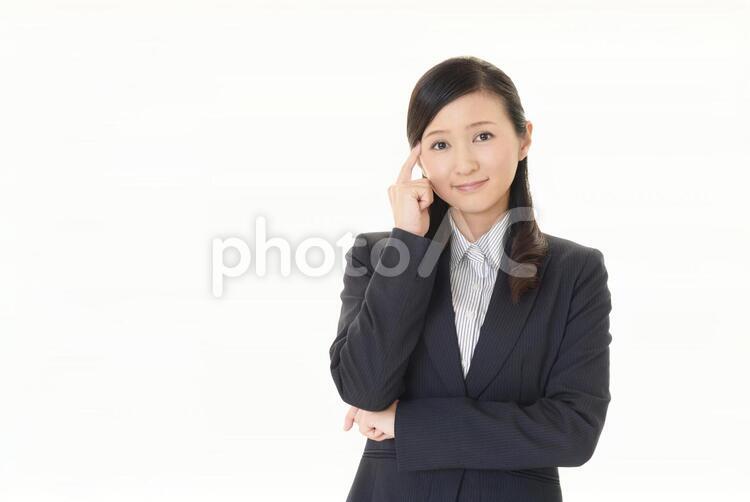 考え事をするビジネスウーマン 女性,ビジネスウーマン,女の写真素材