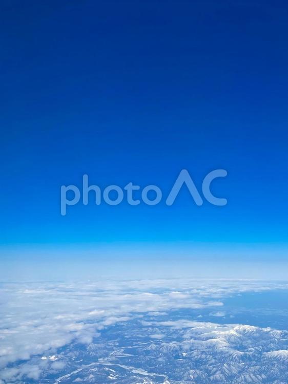 雲の上から見た風景 空撮,空,雲の写真素材
