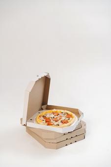 ピザ箱に入ったピザ 配達,フードデリバリー,デリバリーの写真素材