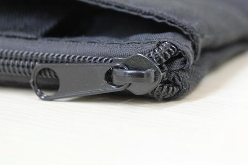 ファスナー黒 チャック,ファスナー,布の写真素材