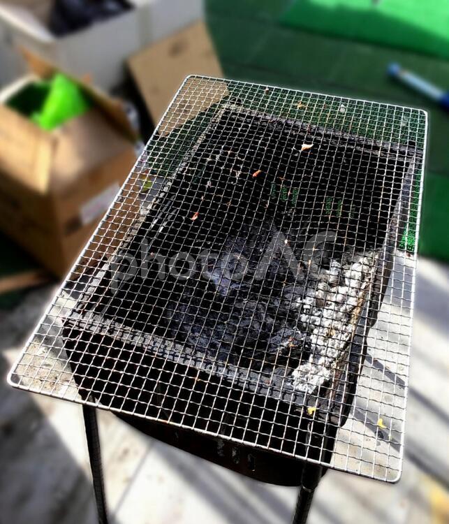 バーベキュー　網　炭　片付け　 焦げ付き,片付け,バーベキューの写真素材