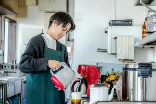 Man brewing coffee, JPG