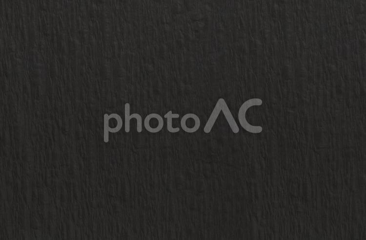 でこぼこした黒色の紙のテクスチャ 黒,黒色,ブラックの写真素材