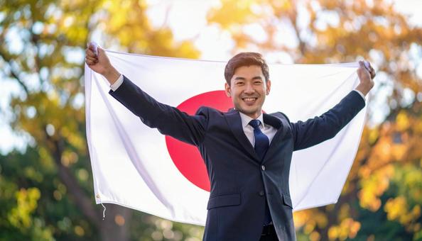 国旗を振るスーツを着たビジネスマンの男性 国旗を振るスーツを着たビジネスマンの男性の写真