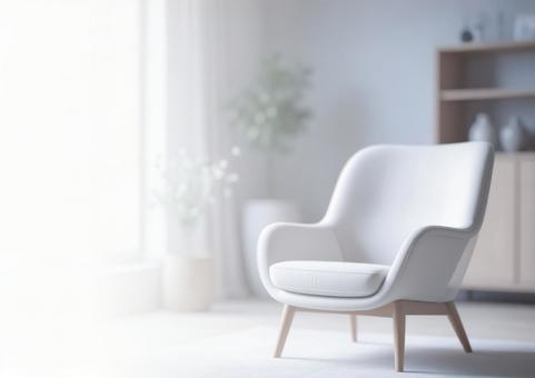 アームチェアと観葉植物の室内・余白ありの写真